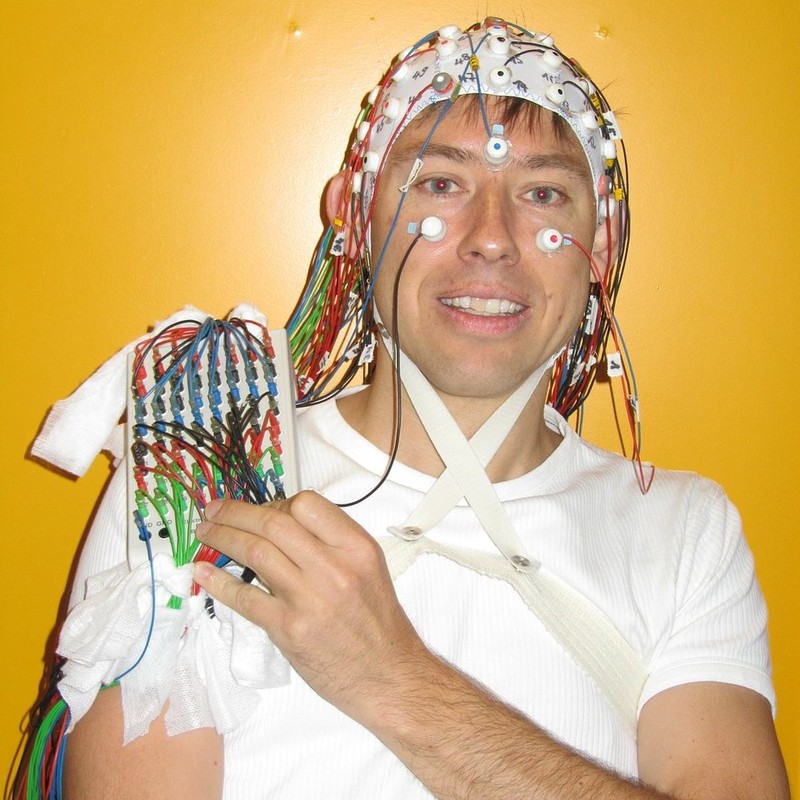 Man wearing an EEG cap.