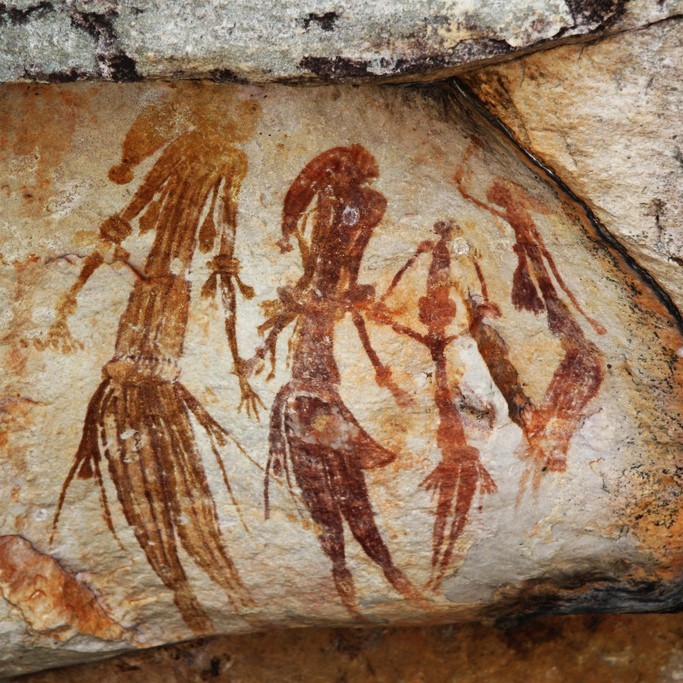 Cave paintings from Western Australia appear to show an ancient family dressed in traditional clothes. 