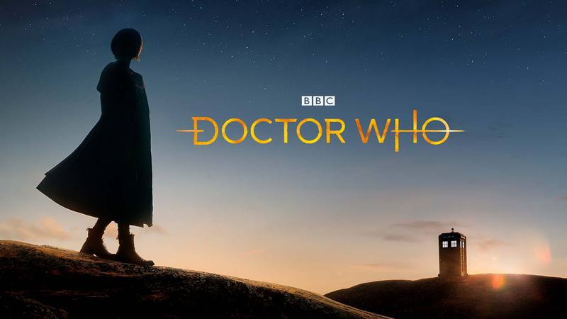 A silhouette looking into the distance where a TARDIS stands on a hill. With the words "Doctor Who" superimposed on the image.