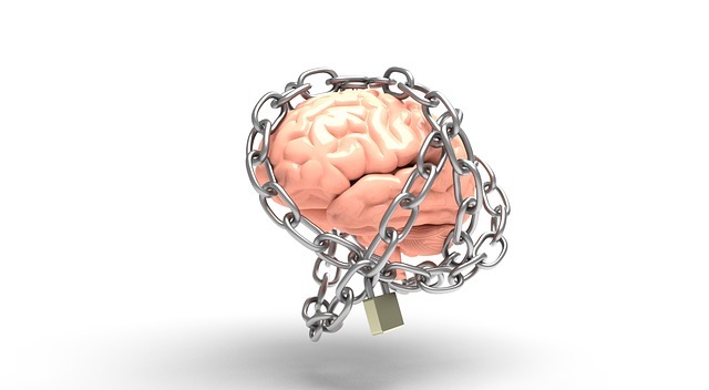 Image of a brain, wrapped with a chain and a lock
