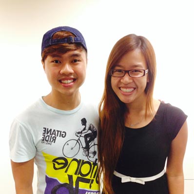 Ang Rui Xia and Ong Jun Hao smiling and facing the camera.