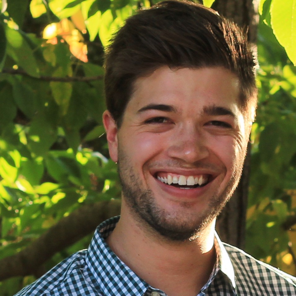 Michael Harris smiling and facing the camera.