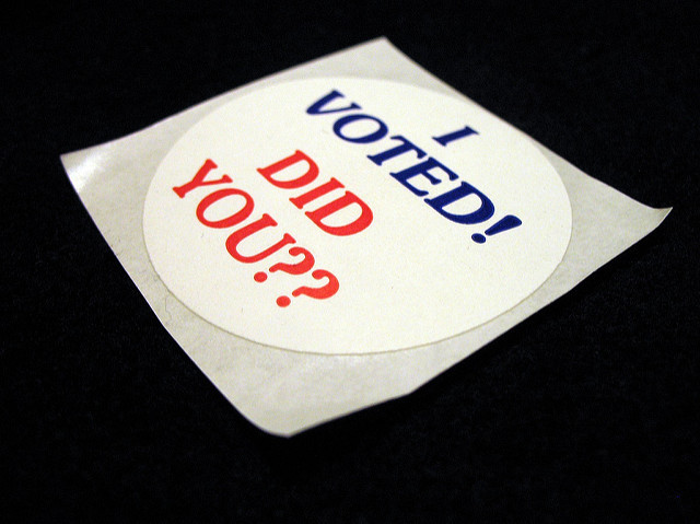 A lapel sticker with the message, "I voted. Did you??"