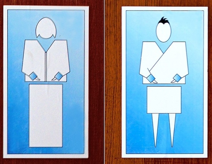 Los letreros de baño del país de Bután muestran representaciones estilizadas de una mujer y un hombre vestidos con ropa tradicional.