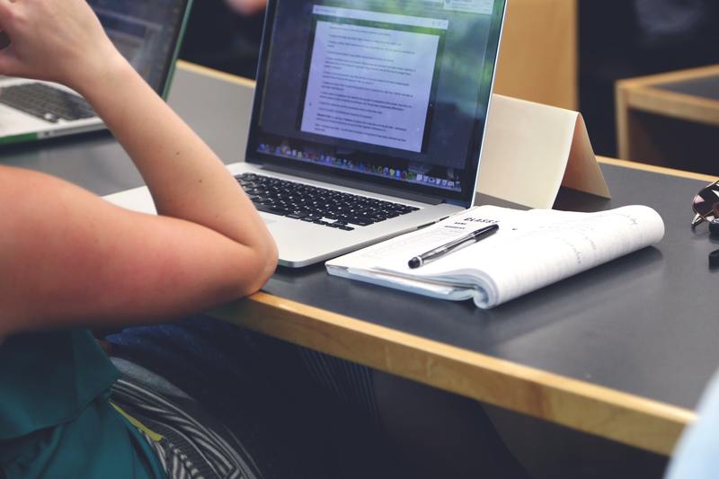 Student studying at a computer