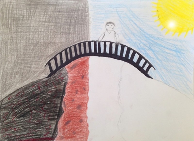 A person who is depicted standing in the middle of a bridge while crossing it. The person is moving from one half of the drawing that depicts a dark sky into another part that depicts the sun and blue sky. 